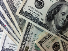 give these to KBOO 100 dollar bills