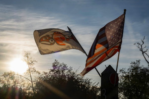 two native flags flowing in the wind