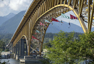 Greenpeace Climbers blockade Ironworkers Memorial Bridge, Vancouver, BC Greenpeace Climbers blockade Ironworkers Memorial Bridge, Vancouver, BC