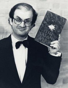 Salman Rushdie and a copy of the offending text, London, 1989. From PA Photos/Landov.