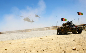 Two Blackhawk helicopters landing at an undisclosed Afghan base Two Blackhawk helicopters landing at an undisclosed Afghan base