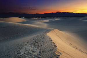 An image of sunrise in Death Valley with the Self Help Radio logo superimposed on it.
